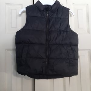 Old Navy black puffer vest.